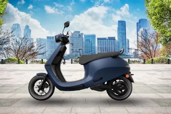 a scooter parked on a sidewalk