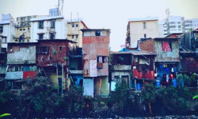 a group of buildings with a group of buildings in the background