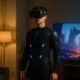 Person wearing VR headset in room.